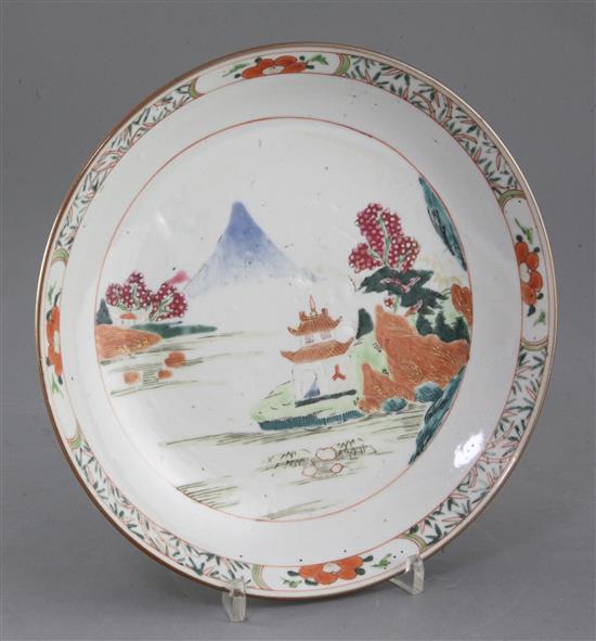 A Chinese famille rose landscape saucer dish, early Qianlong period, diameter 22cm